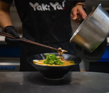 Yaki Ya! kitchen team preparing authentic Japanese ramen